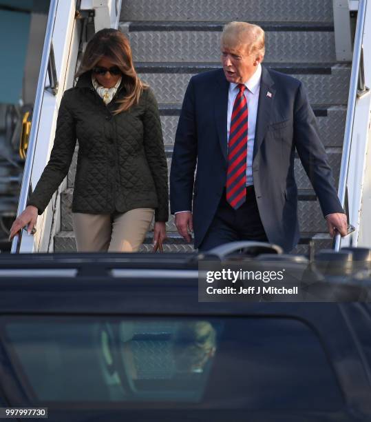 The President of the United States, Donald Trump and First Lady, Melania Trump arrive at Glasgow Prestwick Airport on July 13, 2018 in Glasgow,...