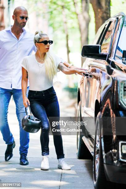Lady Gaga wears a white T-Shirt and Jeans on July 13, 2018 in New York City.