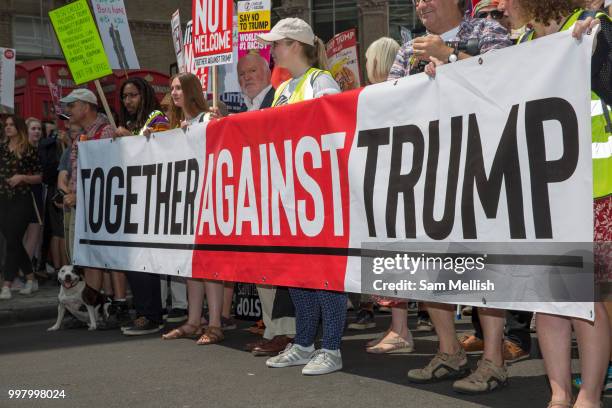 Activists protest against US President Donald Trump's UK visit on the 13th July 2018 in central London in the United Kingdom. Donald Trump is on a UK...