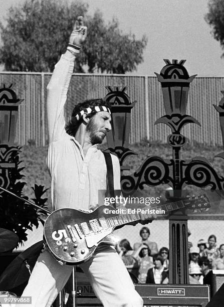 Pete Townshend performs with The Who at Oakland Stadium in October 1976 in Oakland, California.