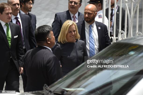 Homeland Security Secretary Kirstjen Nielsen leaves the headquarters of Mexican President-elect Andres Manuel Lopez Obrador's party after holding a...