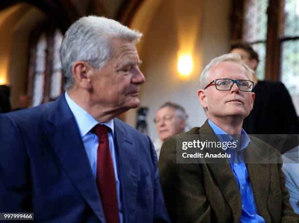 Former German President Joachim Gauck and Pulitzer Prize-winning author and journalist Ian Johnson attend a commemoration for Chinese human rights...