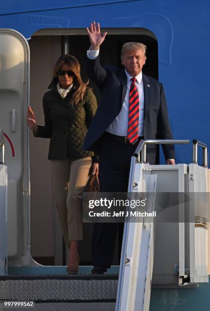 The President of the United States, Donald Trump and First Lady, Melania Trump arrive at Glasgow Prestwick Airport on July 13, 2018 in Glasgow,...