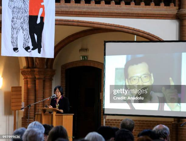Chinese writer Tienchi Martin Liao addresses during a commemoration for Chinese human rights activist and Nobel Peace Prize laureate Liu Xiaobo at...