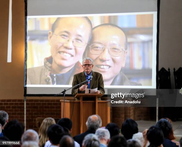 Pulitzer Prize-winning author and journalist Ian Johnson addresses during a commemoration for Chinese human rights activist and Nobel Peace Prize...