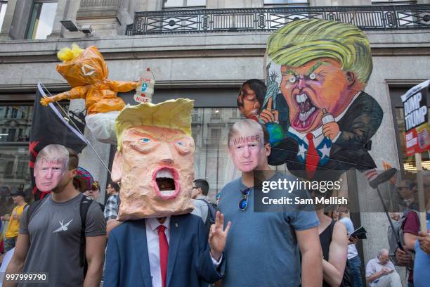 Activists protest against US President Donald Trump's UK visit on the 13th July 2018 in central London in the United Kingdom. Donald Trump is on a UK...