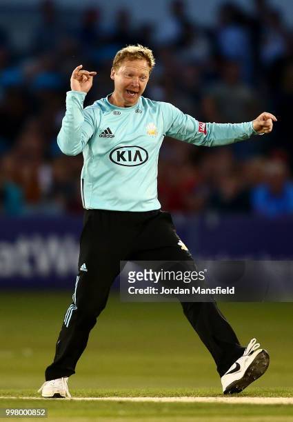 Gareth Batty of Surrey celebrates dismissing David Wiese of Sussex during the Vitality Blast match between Sussex Sharks and Surrey at The 1st...