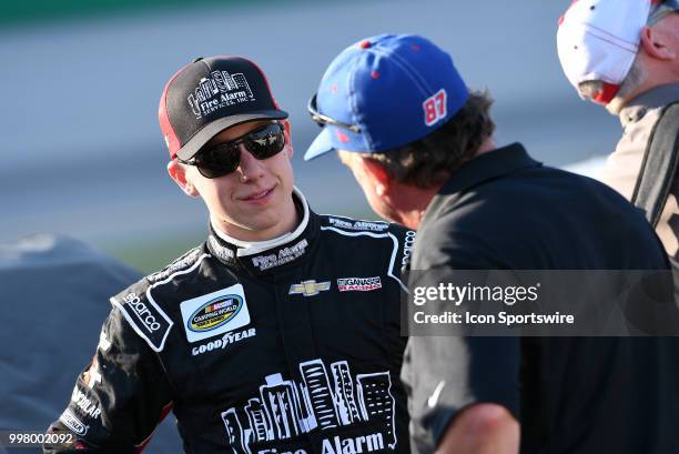 John Hunter Nemechek Joe Nemecheck Racing Chevrolet Silverado talks with Joe Nemechek Joe Nemecheck Racing Chevrolet Silverado before the start of...