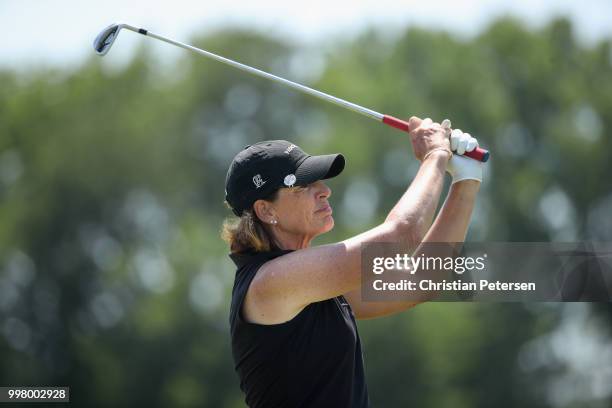 Juli Inkster plays a tee shot on the 13th hole during the second round of the U.S. Senior Women's Open at Chicago Golf Club on July 13, 2018 in...