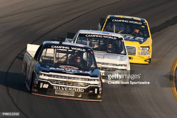 Clay Greenfield Chevrolet Silverado keeps Wendell Chavous SobrietyNation.org Chevrolet Silverado and Grant Enfinger Curb Racing Ford F-150 being his...