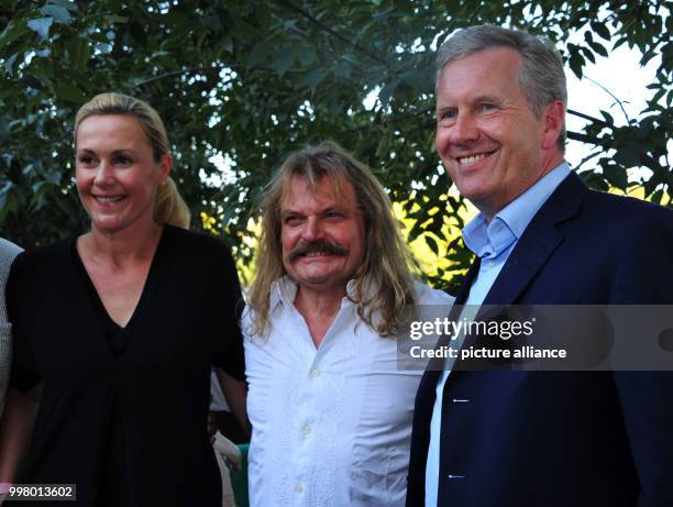 Former German president Christian Wulff , musician Leslie Mandoki and Bettina Wulff ahead of the Wings of Freedom concert in Budapest, Hungary, 8...