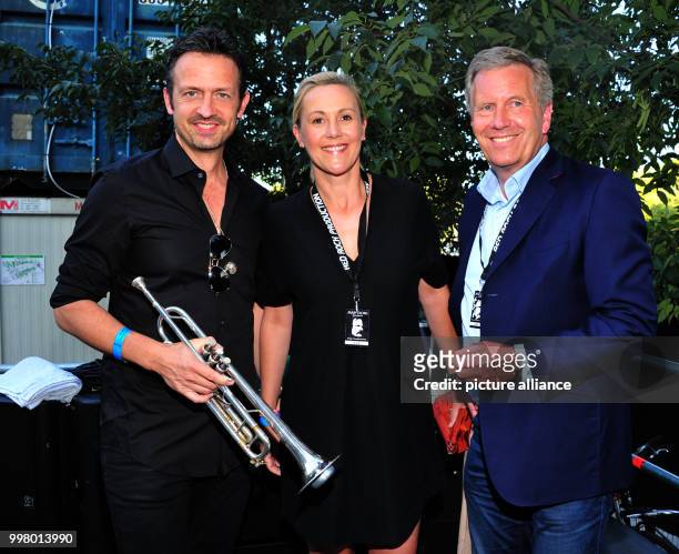 Trumpeter Till Brönner , Bettina Wulff and former German president Christian Wulff at the Wings of Freedom concert at the Sziget Festival in...