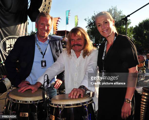 Former German president Christian Wulff , musician Leslie Mandoki and Bettina Wulff at the Wings of Freedom concert at the Sziget Festival in...