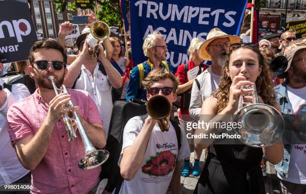 Crowds march on streets of London to protest against American president, Donald Trump visit to the UK on 13 of July, 2018. The demonstration gathered...