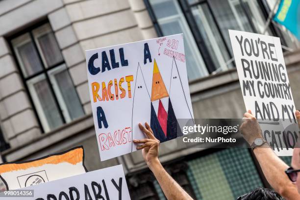 Crowds march on Regent street, London to protest against American president, Donald Trump visit to the UK on 13 of July, 2018. The demonstration...