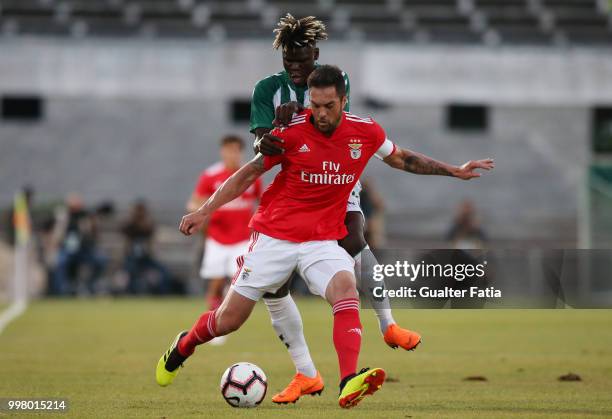 Benfica defender Jardel from Brazil with Vitoria Setubal forward Valdu Te from Guinea Bissau in action during the Pre-Season Friendly match between...