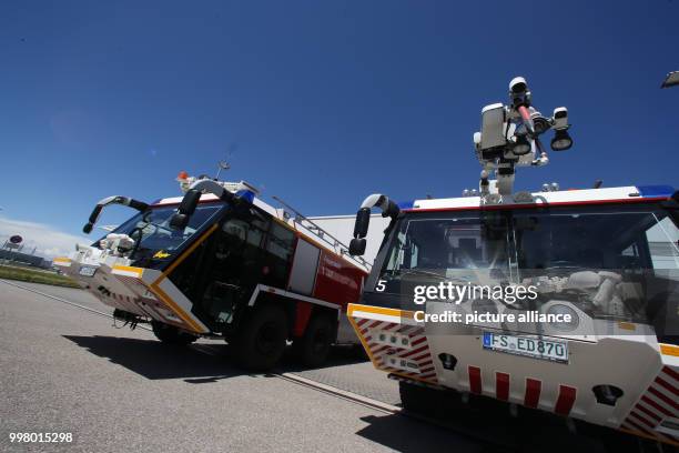 Two fire engines in the airport in Munich, Germany, 7 July 2017. The airport fire brigade is on duty 24 hours a day and is responsible for planning,...