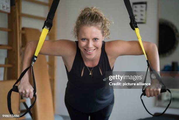 German tennis player Laura Siegemund trains in a physiotherapy studio in Stuttgart, Germany, 8 August 2017. Photo: Marijan Murat/dpa
