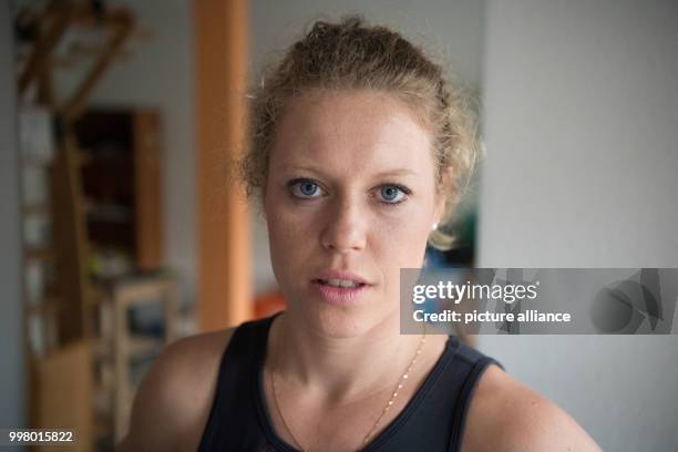 German tennis player Laura Siegemund is interviewed by the German Press Agency in Stuttgart, Germany, 8 August 2017. Photo: Marijan Murat/dpa