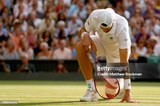 John Isner of The United States reacts during his Men's Singles semi-final match against Kevin Anderson of South Africa on day eleven of the...