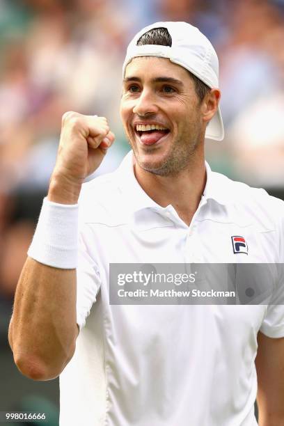 John Isner of The United States celebrates a point against Kevin Anderson of South Africa during their Men's Singles semi-final match on day eleven...