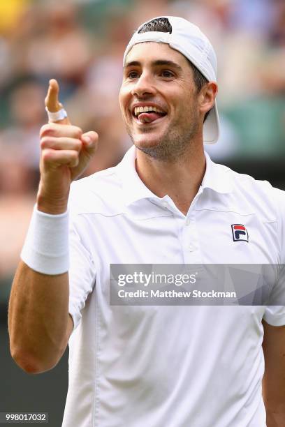 John Isner of The United States celebrates a point against Kevin Anderson of South Africa during their Men's Singles semi-final match on day eleven...