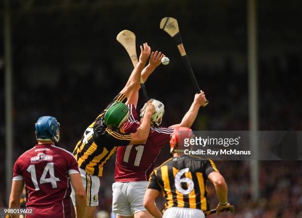 Thurles , Ireland - 8 July 2018; Conor Cooney of Galway and Cillian Buckley of Kilkenny look on as their team-mates Paddy Deegan of Kilkenny and Joe...