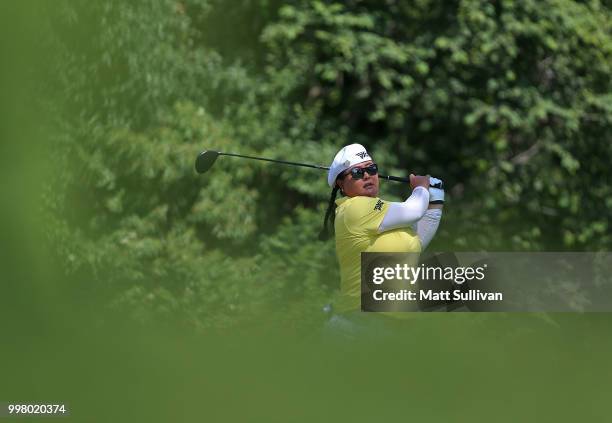 Christina Kim watches her tee shot on the ninth hole during the second round of the Marathon Classic Presented By Owens Corning And O-I at Highland...