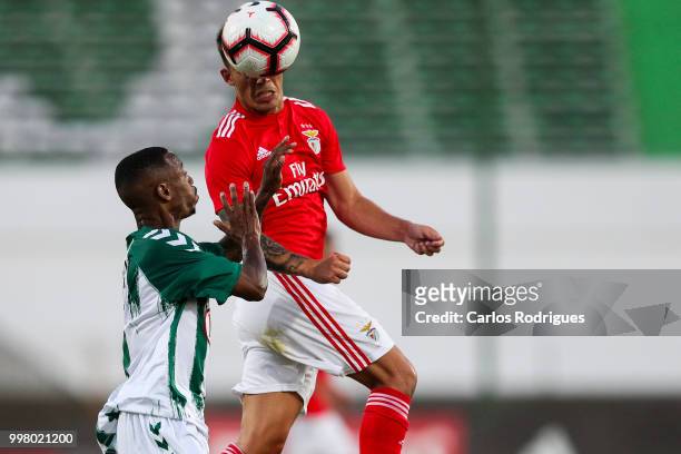Vitoria Setubal forward Leandro Resinda from Netherlands vies with SL Benfica defender Alex Grimaldo from Spain for the ball possession during the...