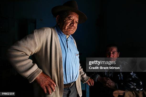 An elderly Peruvian couple working as shop-keepers in the village of Mollepata high above the Apurimac River in the Andes, Soraypampa, Peru, June 25,...