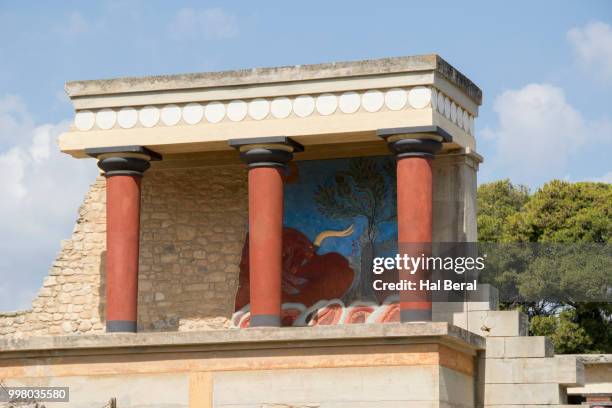 north entrance to the palace of knossos with copy of charging bull fresco - sea of crete stock pictures, royalty-free photos & images