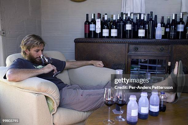 Pieter H. Waiser, the founder of Blank Bottle wine company, samples a new wine blend in his office on March 23, 2010 in Somerset West, South Africa....