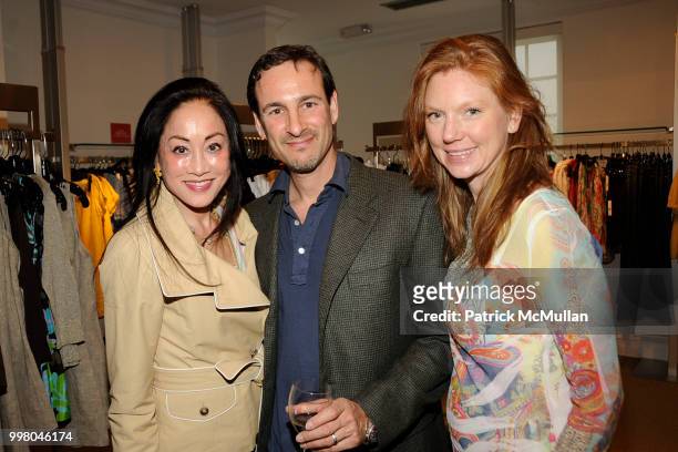 Lucia Hwong Gordon, David Schlachet and Lara Prychodko Schlachet attend Saks Fifth Avenue with Serena Boardman Rosen and Fernanda Niven toast...
