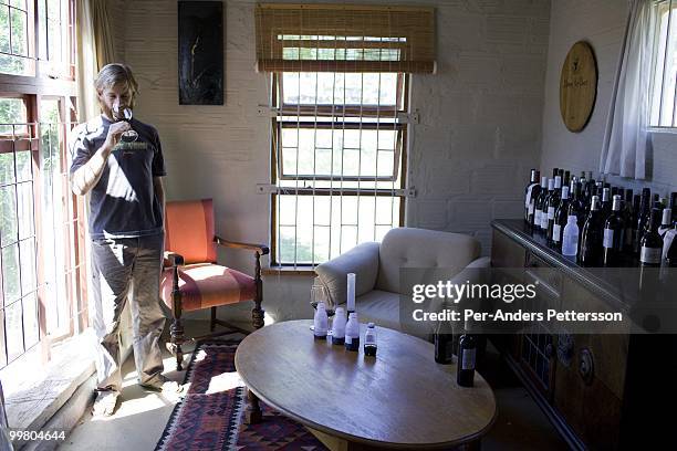 Pieter H. Waiser, the founder of Blank Bottle wine company, samples a new wine blend in his office on March 23, 2010 in Somerset West, South Africa....