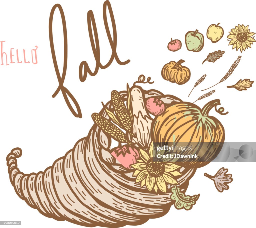Autumn cornucopia greeting design filled with vegetables and fruit with hand lettered greeting