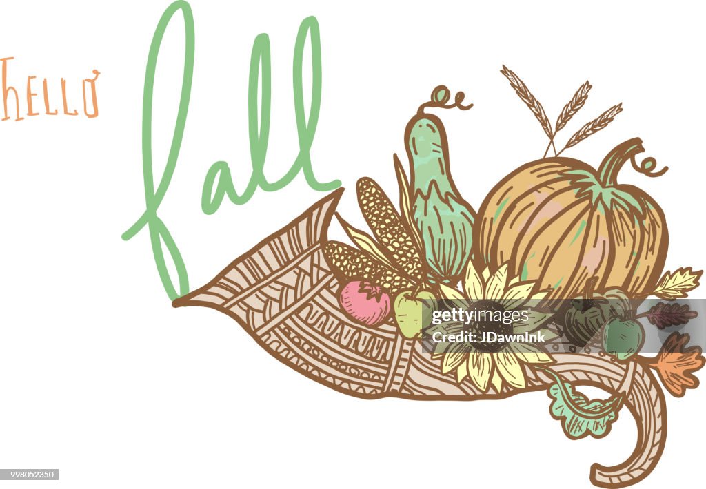 Autumn cornucopia greeting design filled with vegetables and fruit with hand lettered greeting