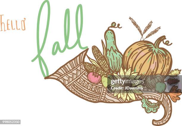 autumn cornucopia greeting design filled with vegetables and fruit with hand lettered greeting - lettered stock illustrations