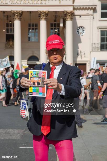 Activists protest against US President Donald Trump's UK visit on the 13th July 2018 in central London in the United Kingdom. Donald Trump is on a UK...