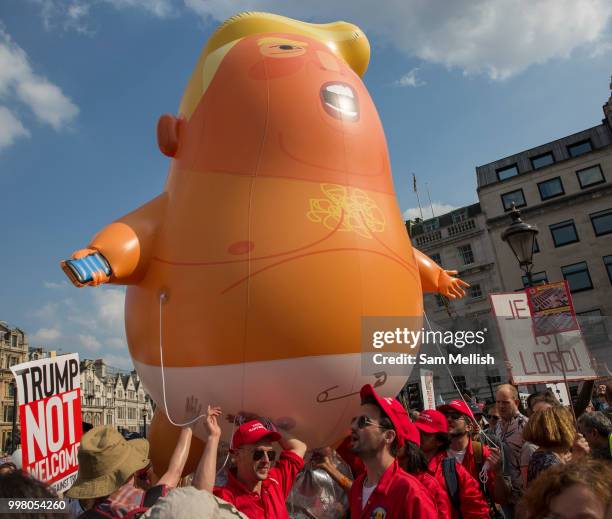 Activists protest against US President Donald Trump's UK visit on the 13th July 2018 in central London in the United Kingdom. Donald Trump is on a UK...