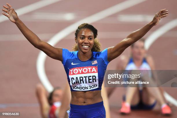 Kori Carter from the USA celebrates her victory at the women's 400 meter hurdling final at the IAAF World Championships, in London, UK, 10 August...