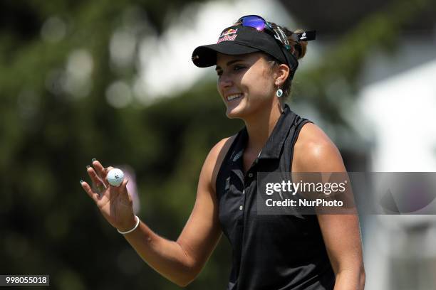 Lexi Thompson of the United States acknowledges the gallery after finishing the 18th hole during the second round of the Marathon LPGA Classic golf...