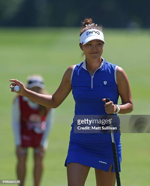 Annie Park waves to the gallery after making a putt on the seventh hole during the second round of the Marathon Classic Presented By Owens Corning...
