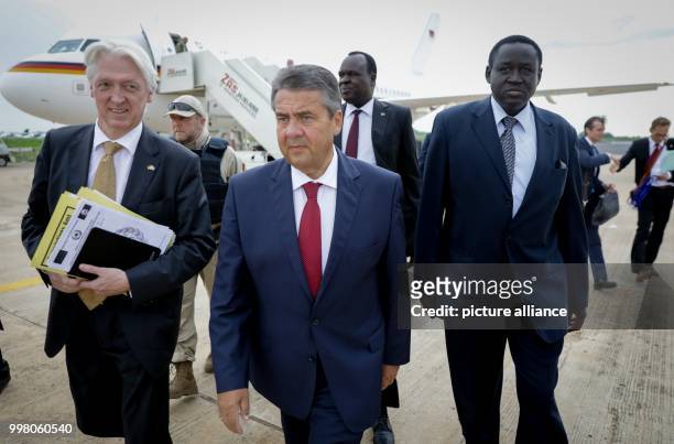 German Foreign Minister Sigmar Gabriel being greeted at the International Airport of Juba by the German Ambassador in South Sudan, Johannes Lehne and...