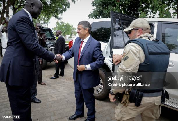 German Foreign Minister Sigmar Gabriel being greeted at the Presidential Palace by Chief of Protocol Bol Wek in Juba, South Sudan, 10 August 2017....