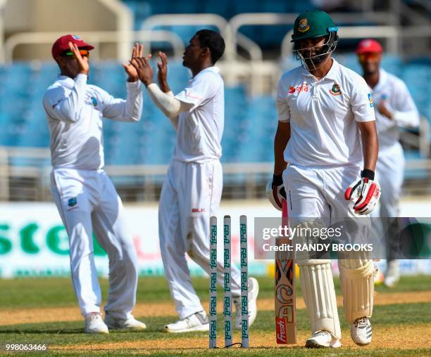 Tamim Iqbal of Bangladesh walks off dismissed by Keemo Paul of the West Indies during day 2 of the 2nd Test between West Indies and Bangladesh at...