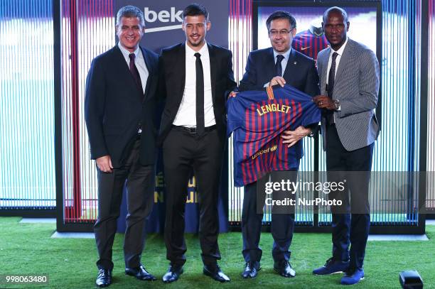 Josep Maria Bartomeu, president of FC Barcelona, Jordi Mestre, vicepresident of FC Barcelona, and Eric Abidal, technical director, during the...