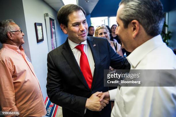 Senator Marco Rubio, a Republican from Florida, greets supporters during an event for Florida Governor Rick Scott's senate campaign in Hialeah,...