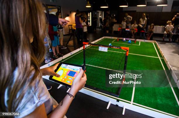 Match of robots at Design Center Digital in Warsaw, Poland on 13 July before the finals of the 2018 World Cup in football, during which France won...