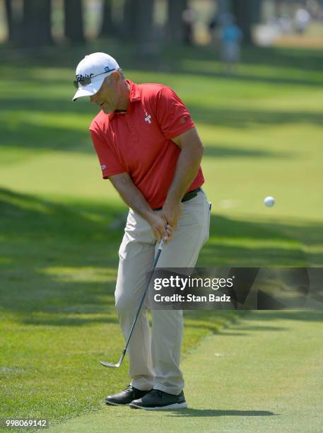 Tom Byrum hits a chip shot on the 16th hole during the second round of the PGA TOUR Champions Constellation SENIOR PLAYERS Championship at Exmoor...