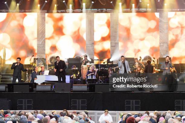 Carlos Marin, David Miller, Sebastien Izambard and Urs Buhler and of Il Divo perform on stage at Edinburgh Castle Esplanade on July 13, 2018 in...